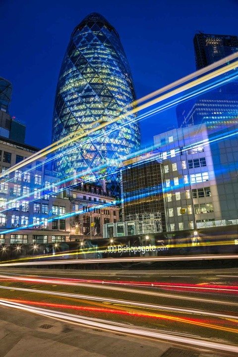 London Gherkin Building at Night with Car Light Trails