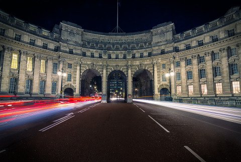 St James Gate Building Architecture in London at night with car Trails