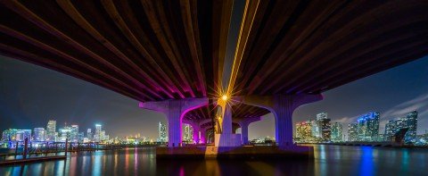 architecture macarthur causeway floyover in miami at night with skyline panorama