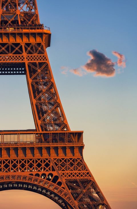 abstract section of Eiffel Tower in sunlight in Paris France