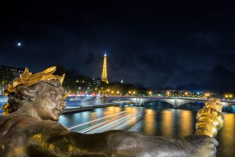 Eiffel Tower and River Seine and statues from Pont Alexandre III