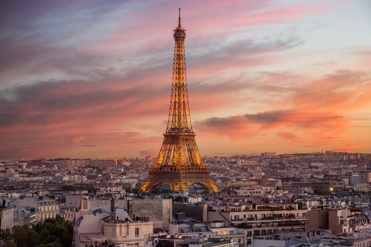 Eiffel Tower and Paris rooftops at sunset