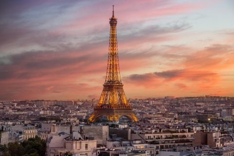 Eiffel Tower and Paris rooftops at sunset