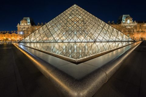 Louvre Museum at night in Paris France