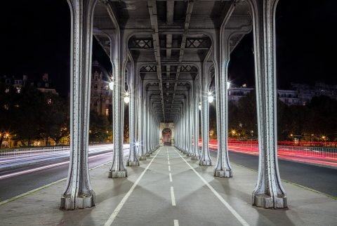 Paris Pont Bir Hakeim Bridge at night with car trails