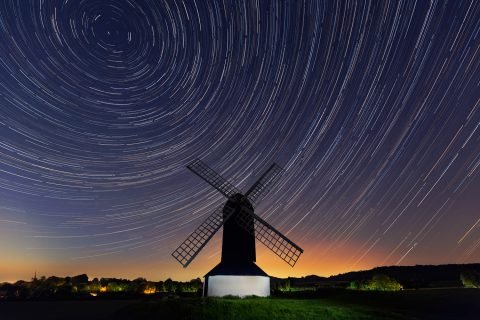 star trails windmill landscape england